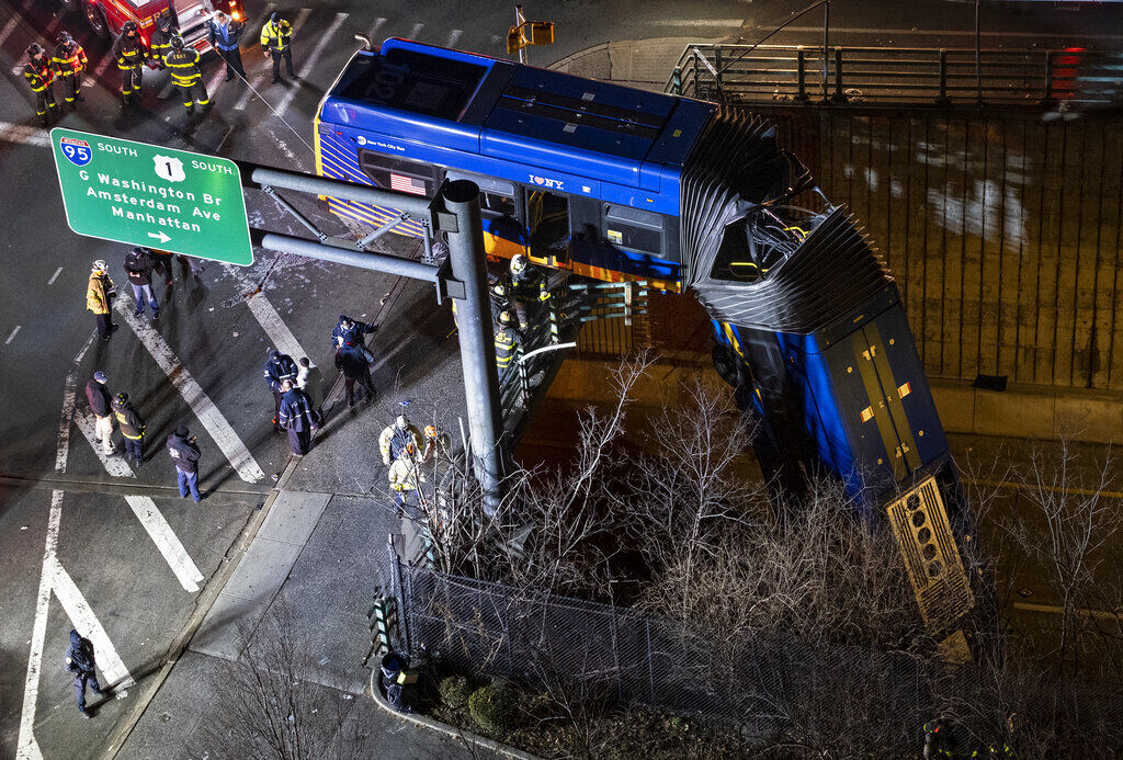APTOPIX Bus Crash Overpass